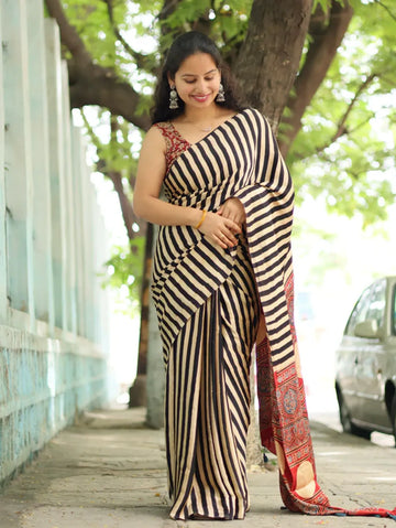 "Elegant Black and Beige Striped Modal Silk Saree with Traditional Ajrakh Print"