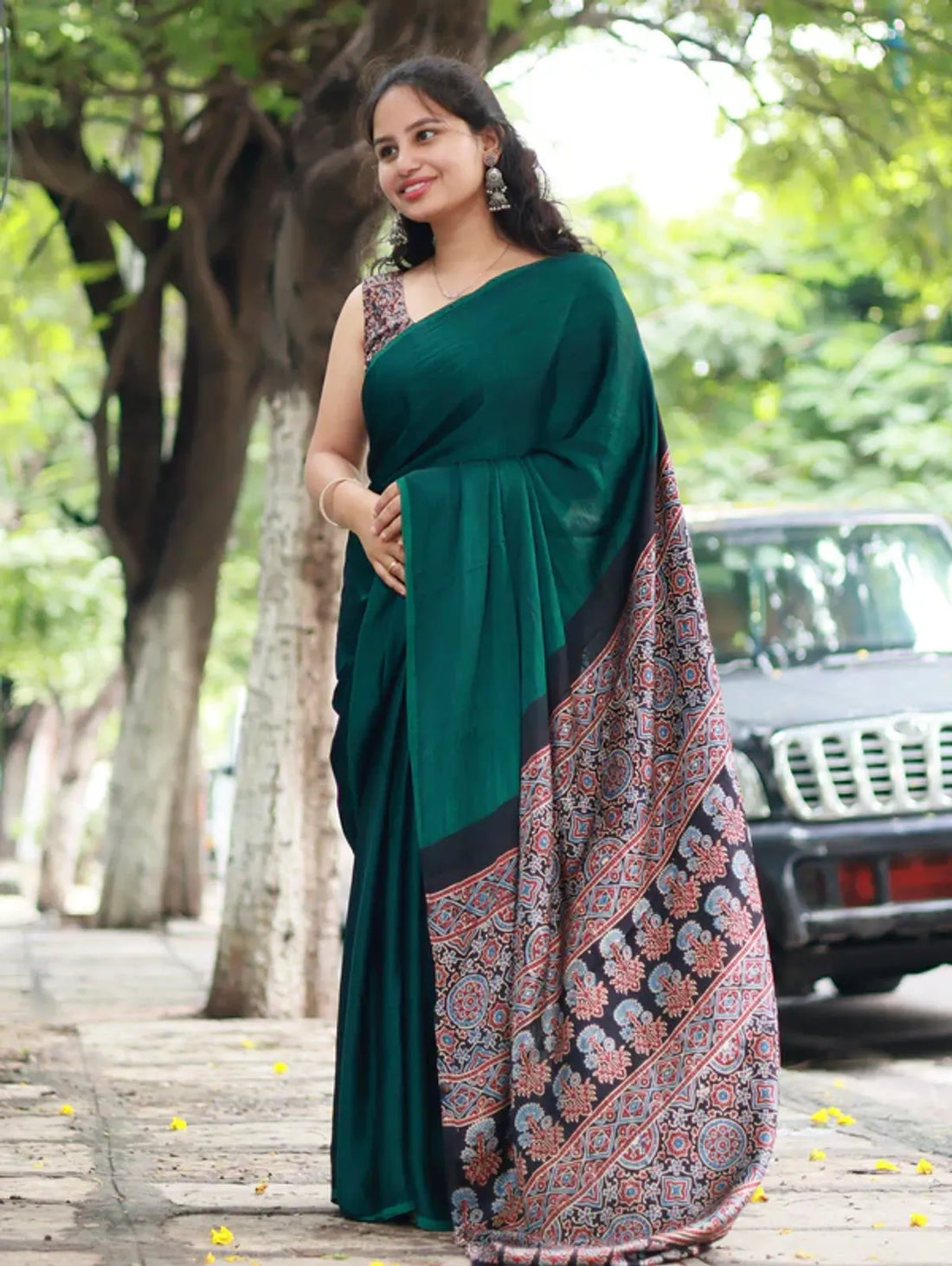"Teal Green Saree with Ajrakh Pallu in Modal Silk"