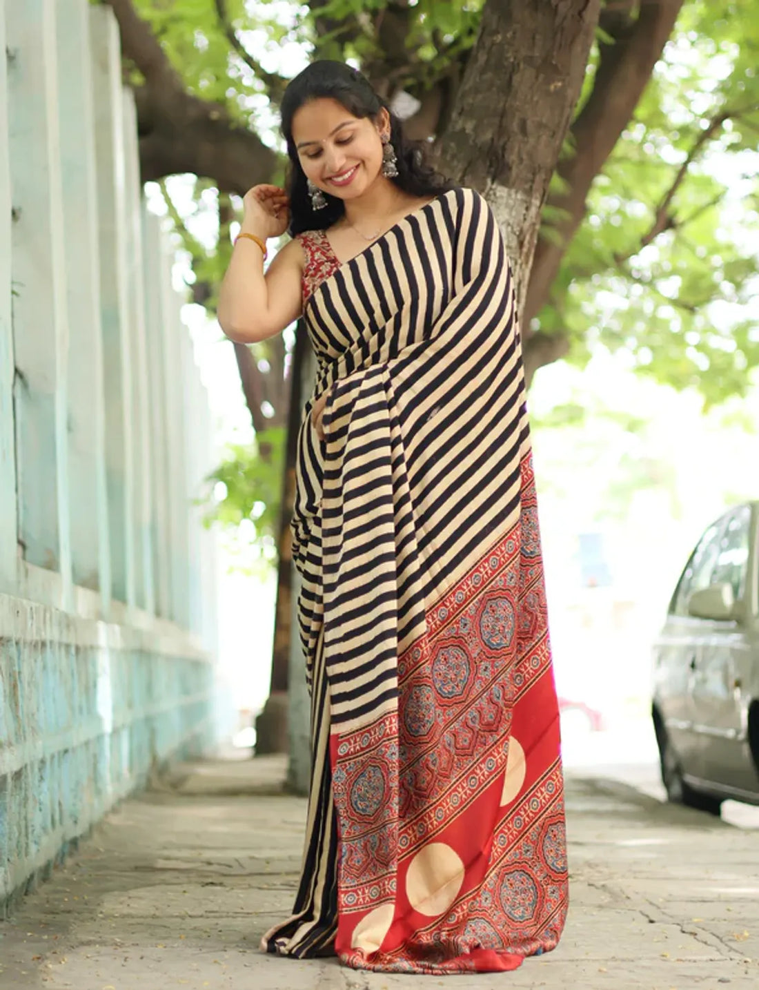 "Elegant Black and Beige Striped Modal Silk Saree with Traditional Ajrakh Print"