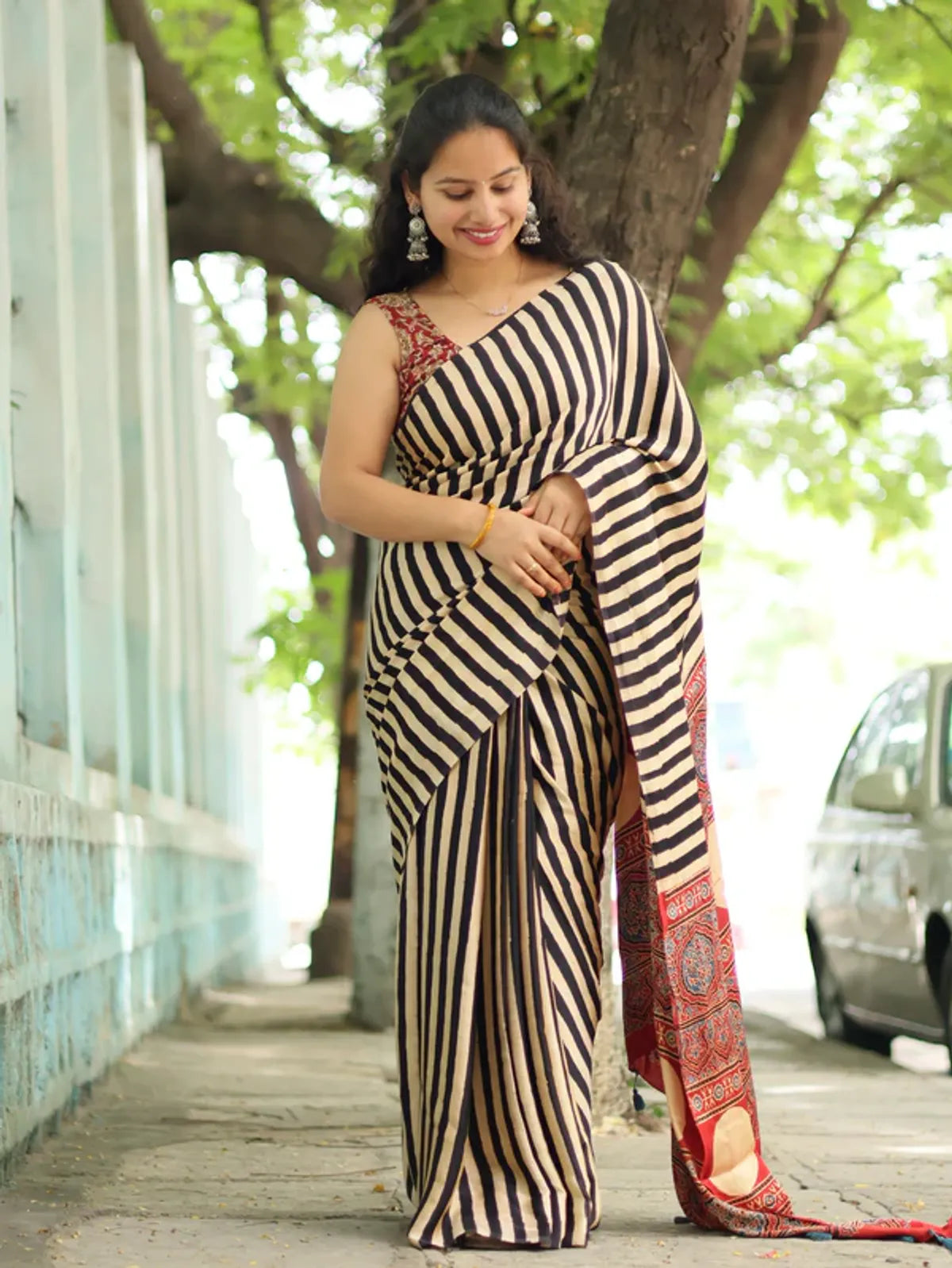 "Elegant Black and Beige Striped Modal Silk Saree with Traditional Ajrakh Print"