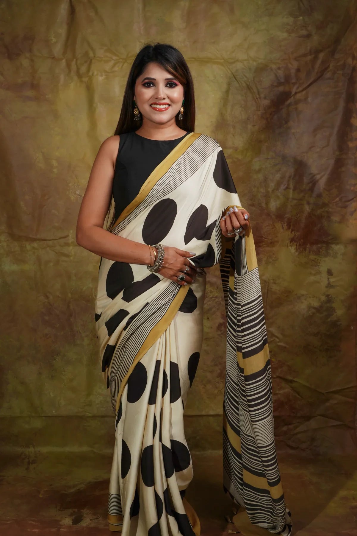 "Modern Polka Print Saree in Cream and Black with Statement Pallu"
