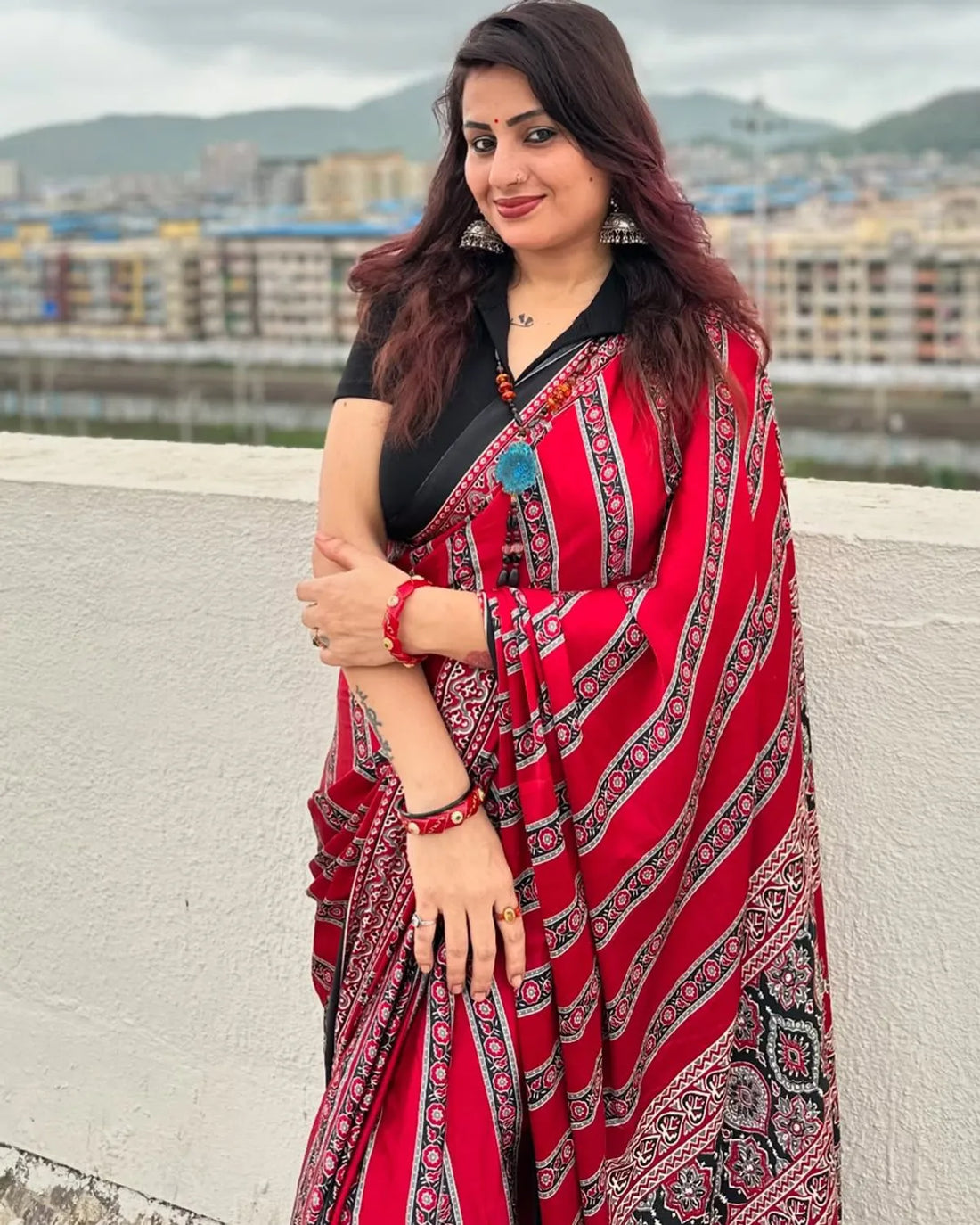 Traditional Red and Black Printed Ajrakh Saree with Intricate Border