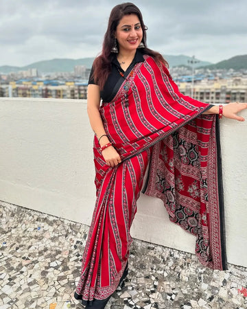 Traditional Red and Black Printed Ajrakh Saree with Intricate Border