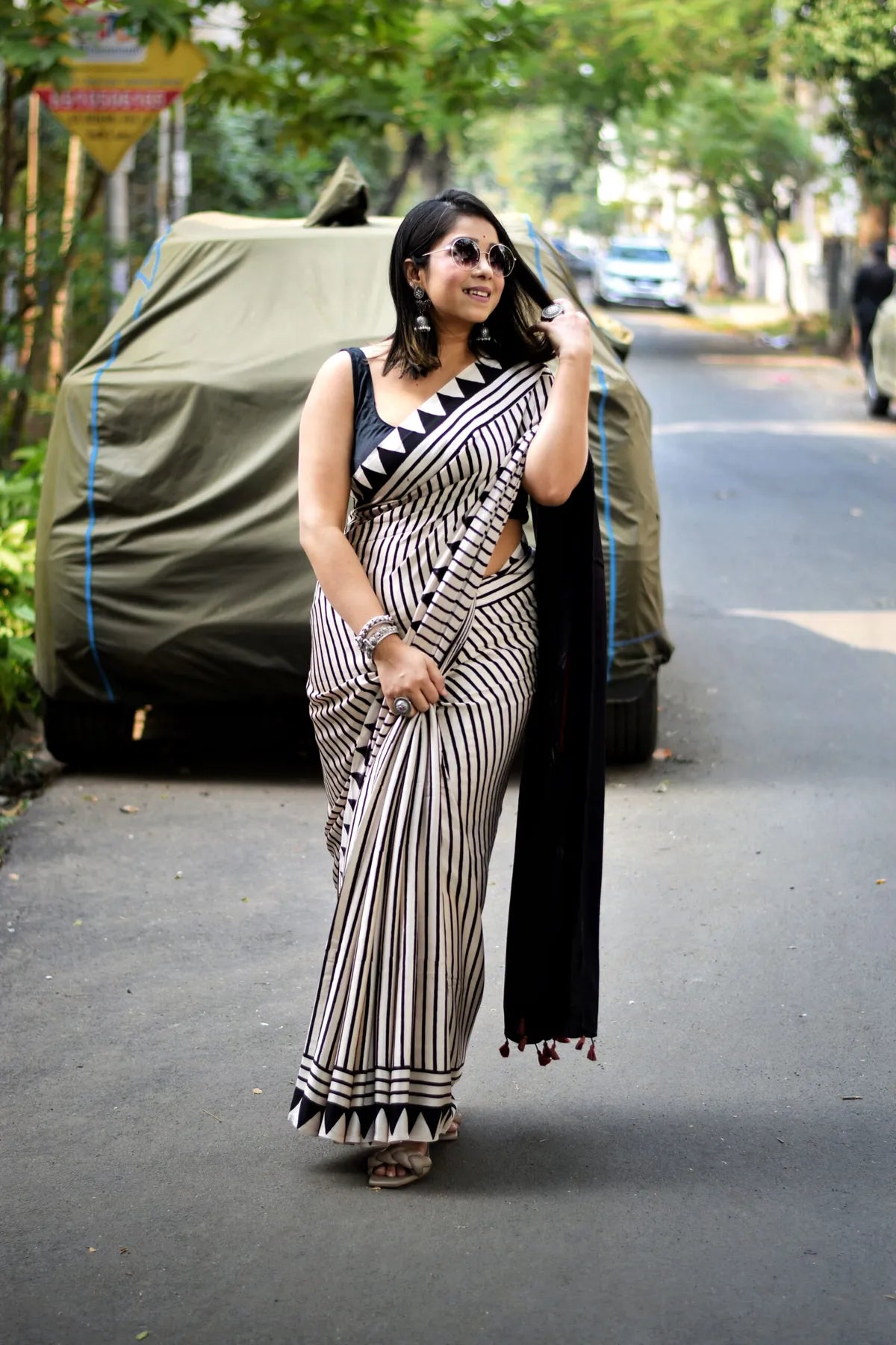 "Grace in Black and White A Timeless Saree of Stripes And Sophistication"
