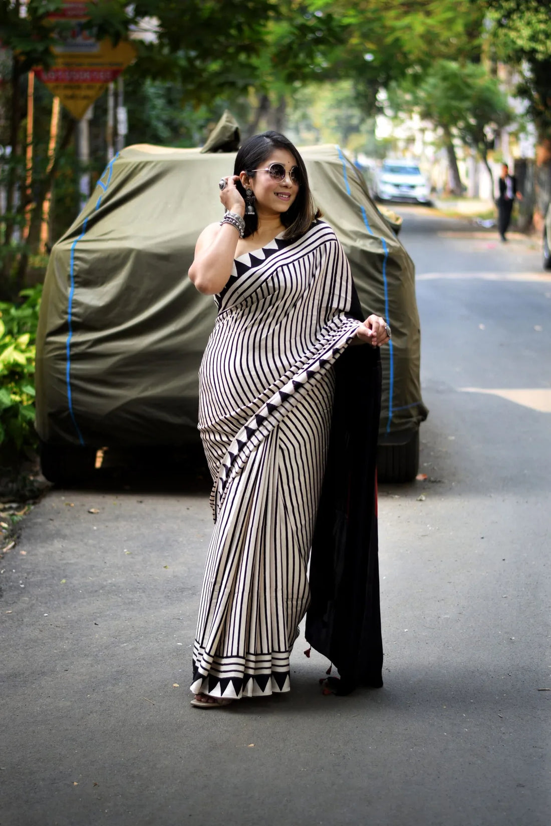 "Grace in Black and White A Timeless Saree of Stripes And Sophistication"
