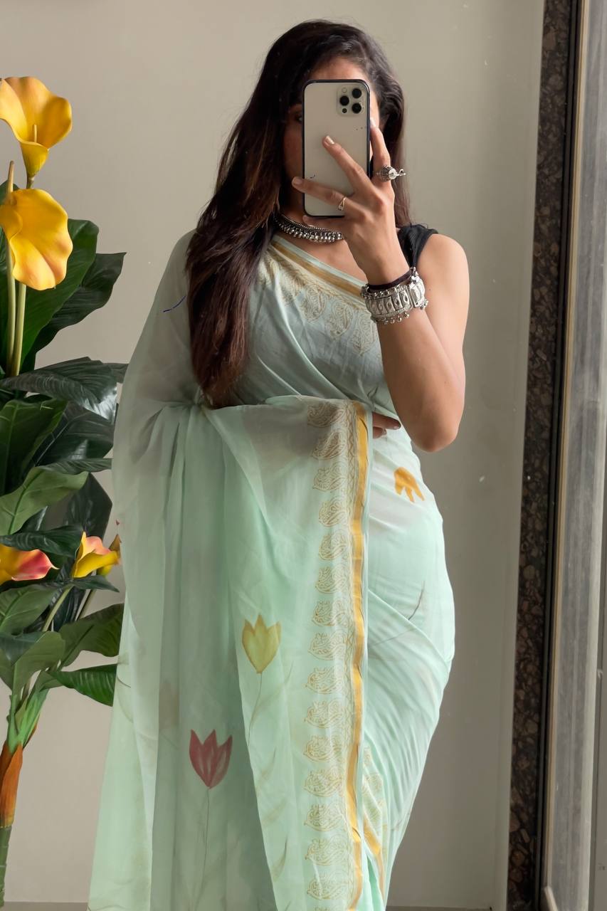 Light Green Floral Cotton Saree With Gold Border